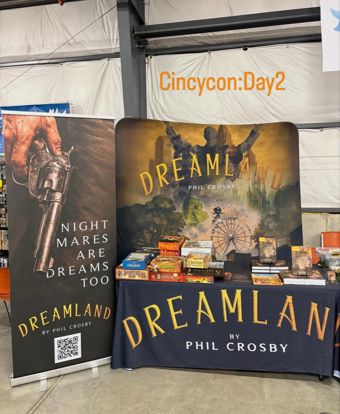 Phil Crosby's convention booth with the DreamLand banner and a second banner reading Nightmares Are Dreams Too